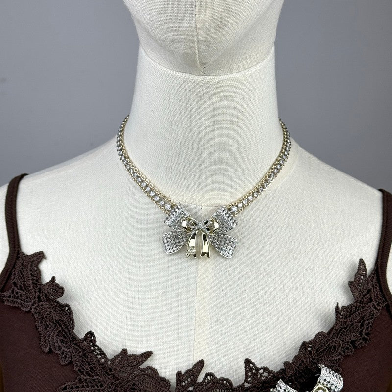 18K  Chanel 25K Bow Tie Choker Necklace