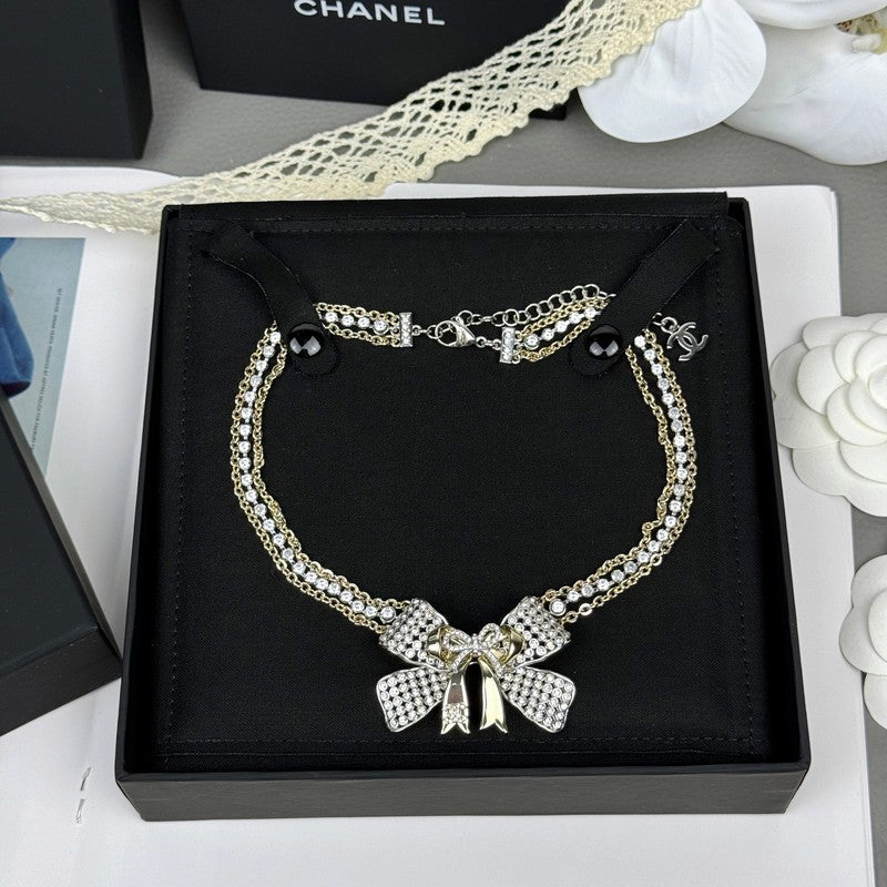 18K  Chanel 25K Bow Tie Choker Necklace