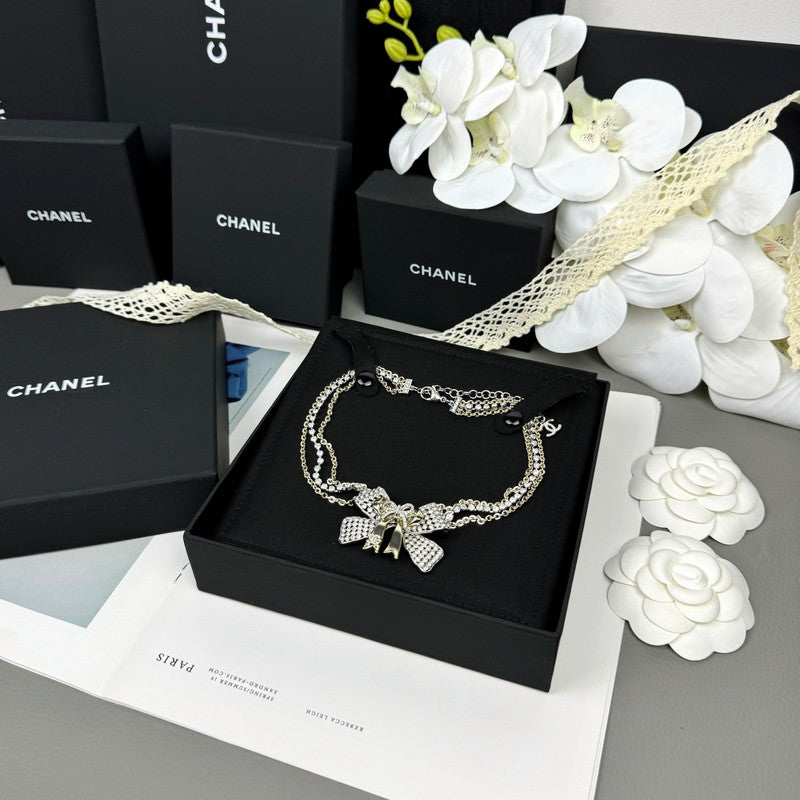 18K  Chanel 25K Bow Tie Choker Necklace